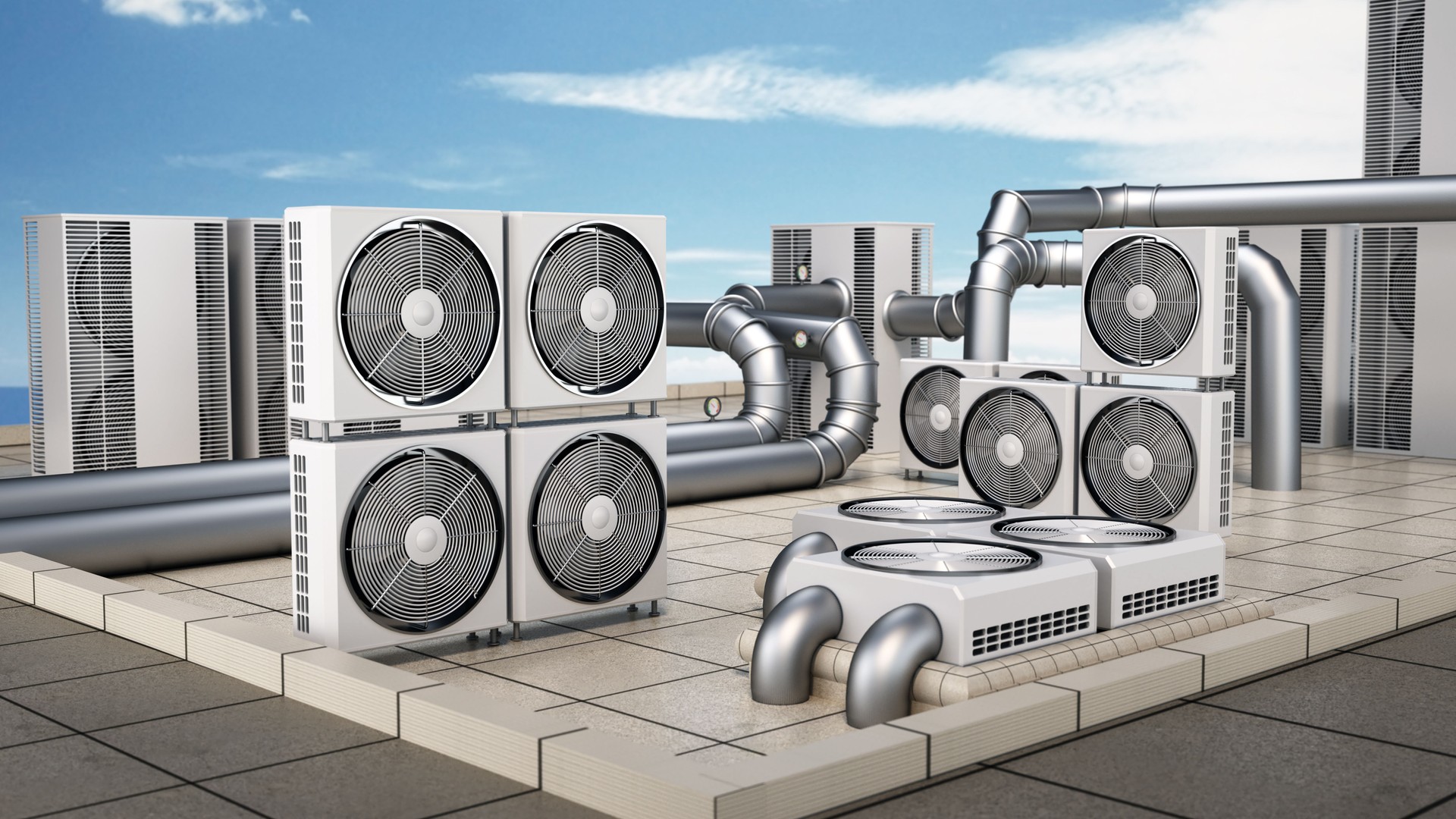 Air conditioning units on a rooftop with city skyline and clear blue sky providing efficient cooling solutions